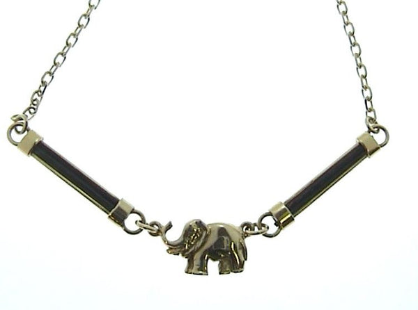 Gold ring with a small gold elephant on bands of elephant hair