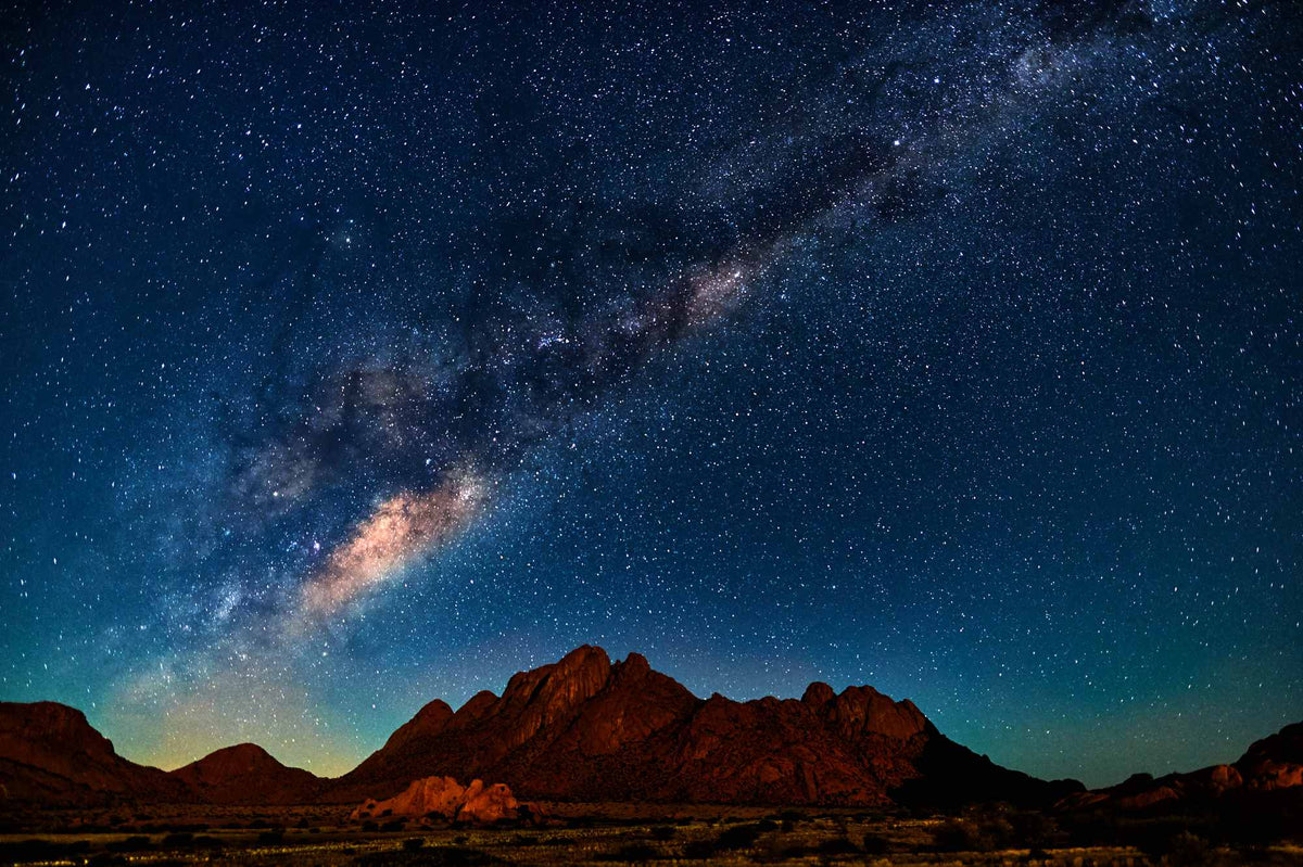 The Milky Way over granite peaks in the Namibian desert